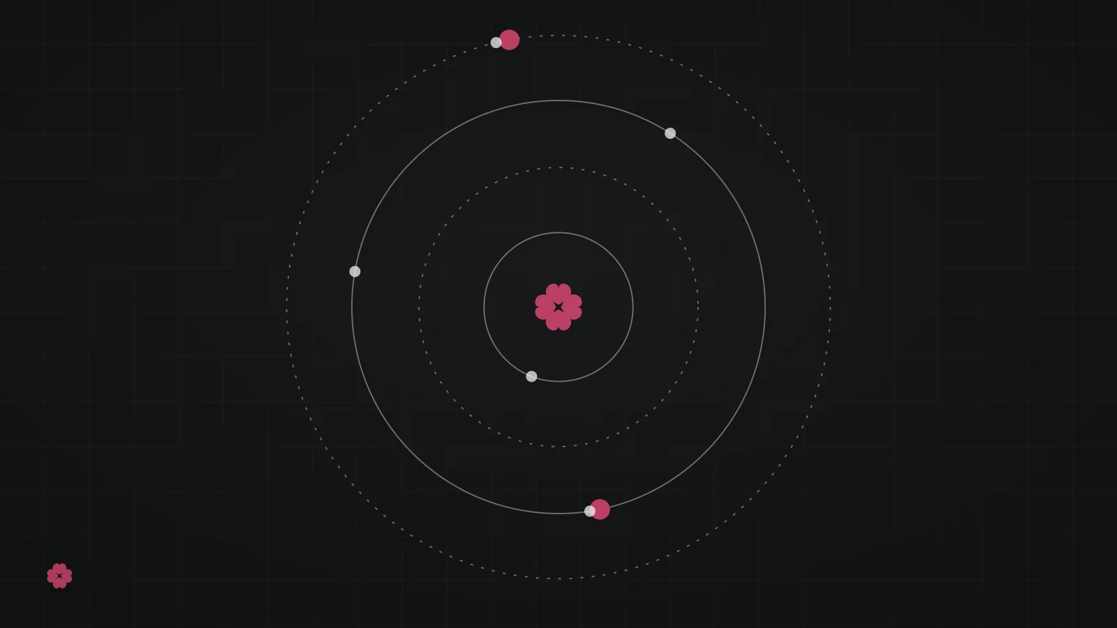 Abstract concentric orbit motif in raspberry on graphite.